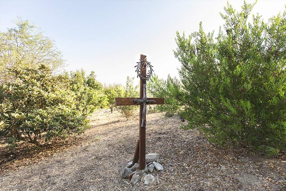 A wooden cross in the Heritage Garden