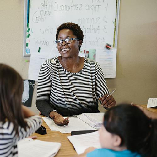 A teacher educating a class